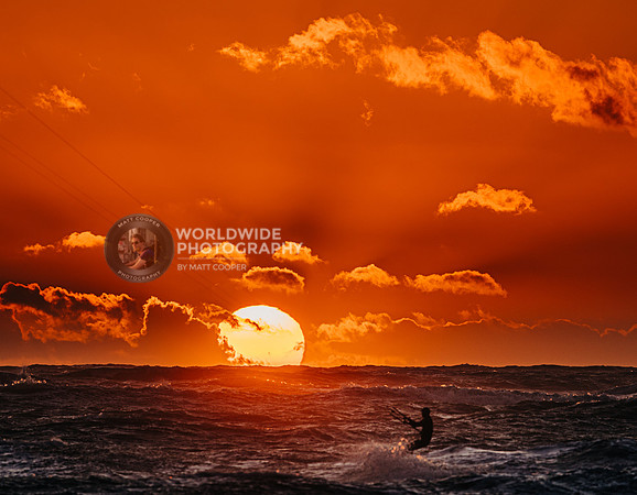 Kite surfer at sunset