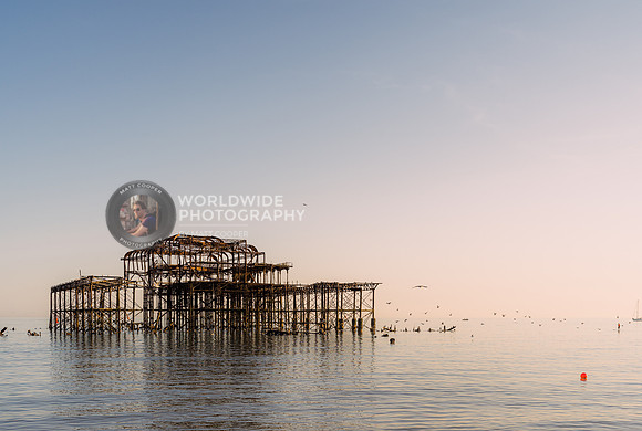 The West Pier in Brighton at sunset