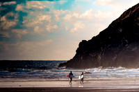 Surfers on Lusty Glaze Beach